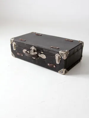 antique black suitcase