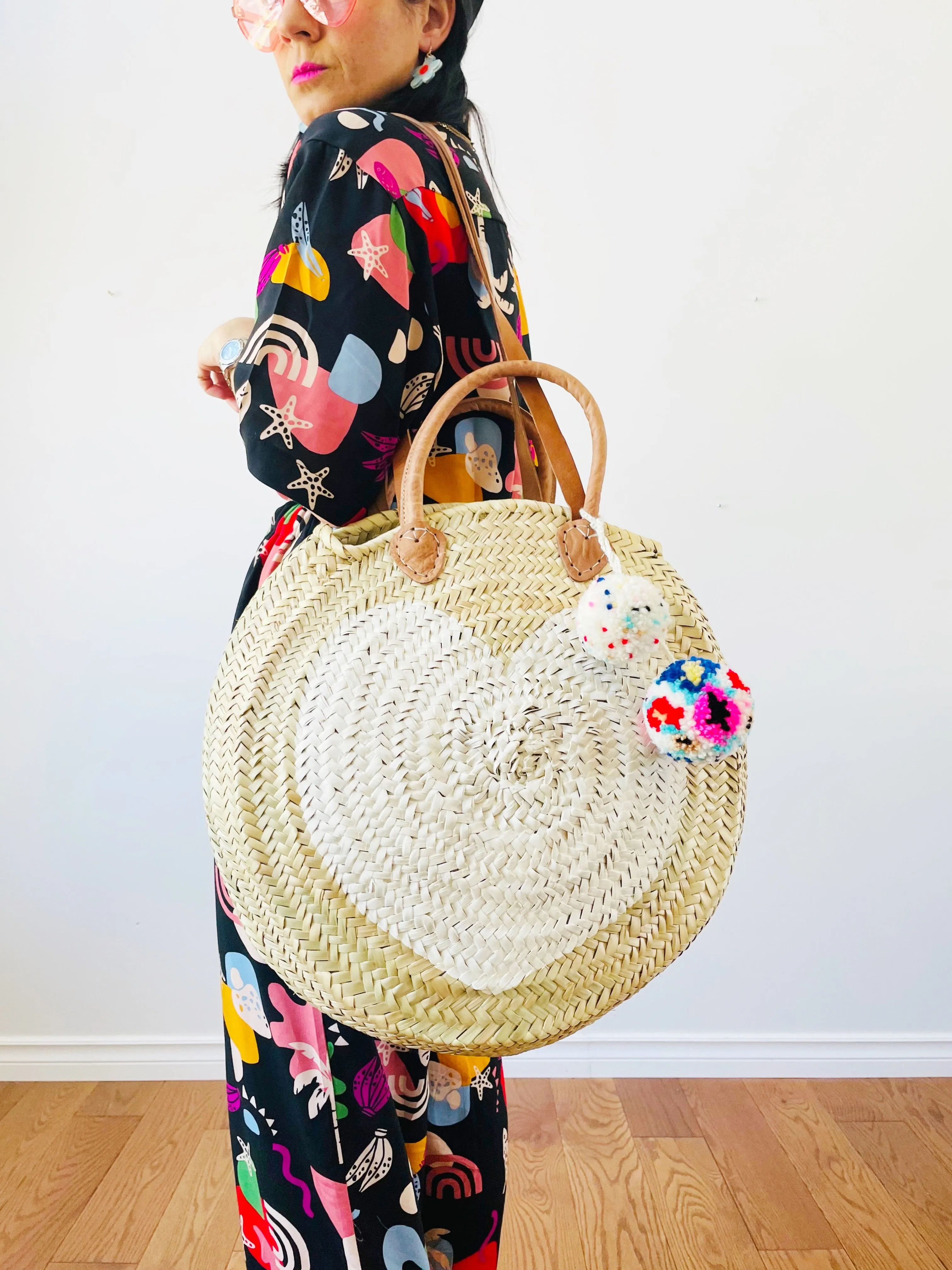 Round  Straw Bag with Leather Straps and Poms by Poppy Joy Pompoms